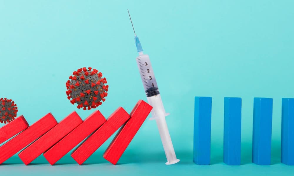 Concept of covid19 coronavirus pandemic with falling chain like a domino game. Contagion and infection progression stopped by a vaccine of medical research. Cyan background New app allows bosses to check on who has received the Covid vaccine