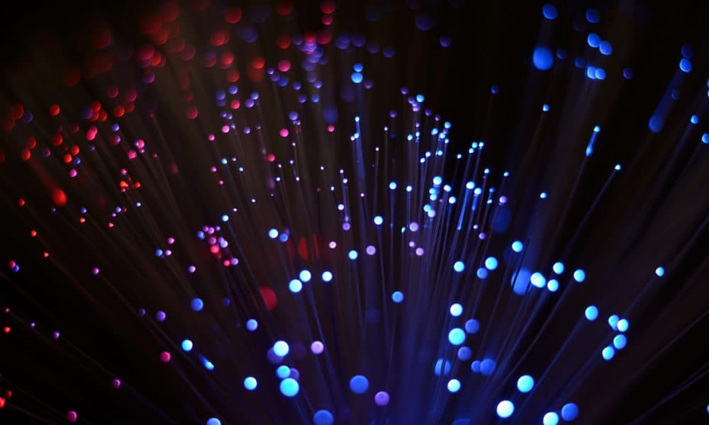 Blurred abstract pink and blue bokeh lights. Christmas holiday defocused background Funding secured to produce new fluorescent materials for diagnostics