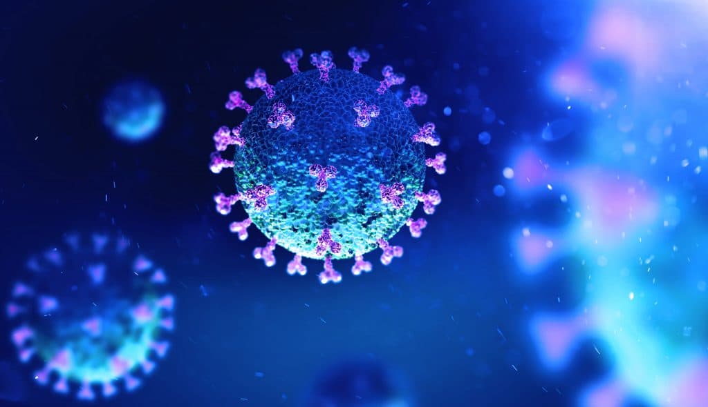 Playing COVID catch up with new technology: Photo features a blue and purple virus ball