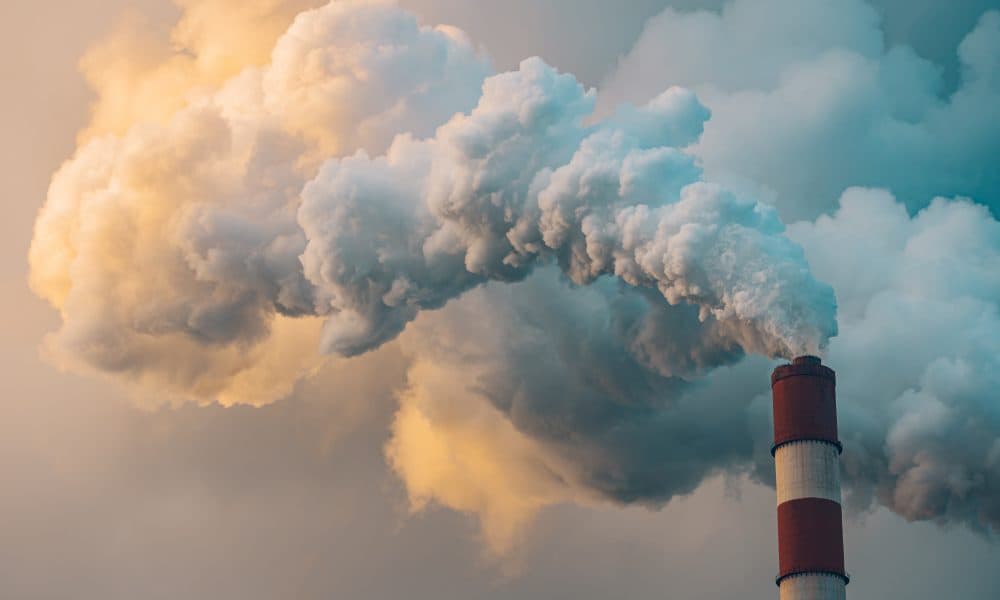 Thick smoke from plant chimney polluting the air GPs call for point of care testing to cut carbon emissions