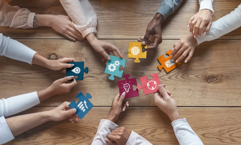 International team of coworkers putting colorful puzzles together A range of ICT procurement frameworks are available from the four-hub NHS procurement partnership