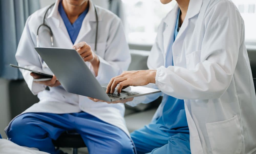 Hospital Ward. Doctor Talks With Professional Head Nurse or Surg Luscii-powered LNWH virtual wards nominated for HSJ Digital Award