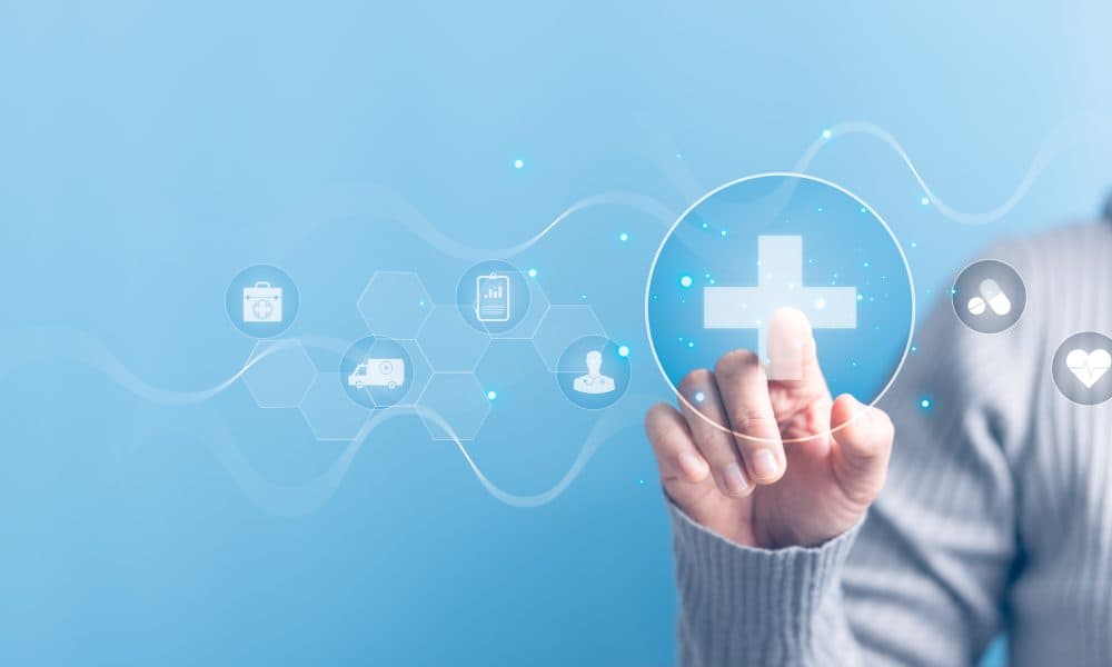Woman hand touching plus with healthcare medical icon on blue sky background. Health insurance health concept. Access to welfare health and copy space, benefit pharmacy, plan community treatment. Intelliguard unveils enhanced suite of medication management and data intelligence solutions