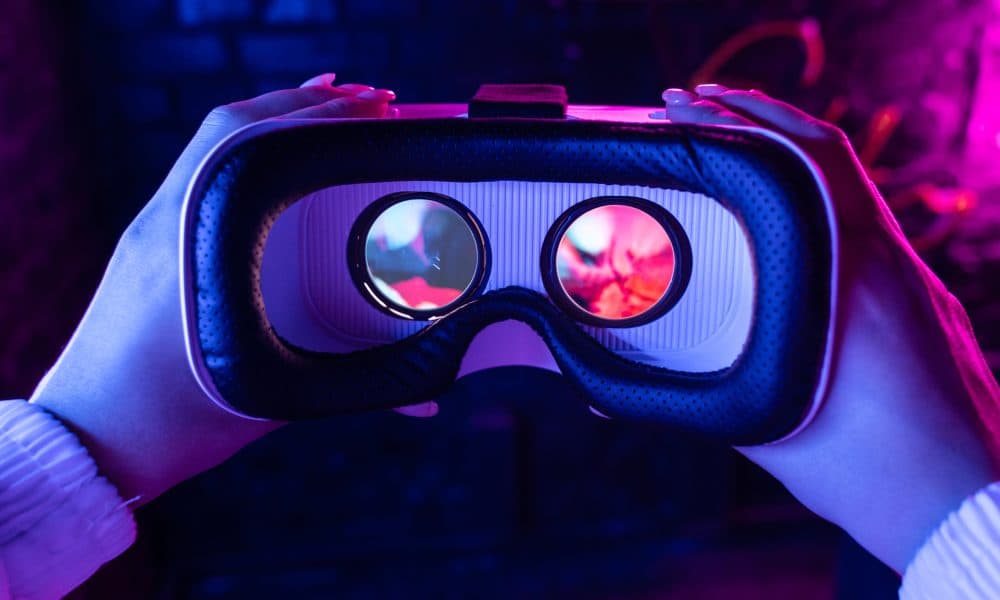 Female hands hold 3d 360 vr headset wear ar innovative glasses g VR prepares homeless people for independent living