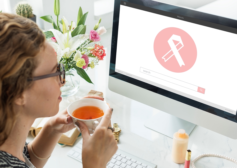 Pink Ribbon Breast Cancer Healthcare Concept Virtual cancer clinic Perci Health raises £3m
