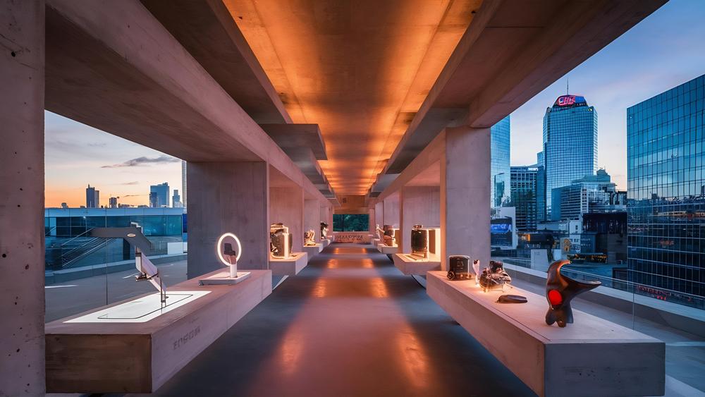 space-products-showcases-concrete-hallway-with-city-evening-background Designing for Digital Nomads: How to Create a Tech-Savvy Space That Moves With You